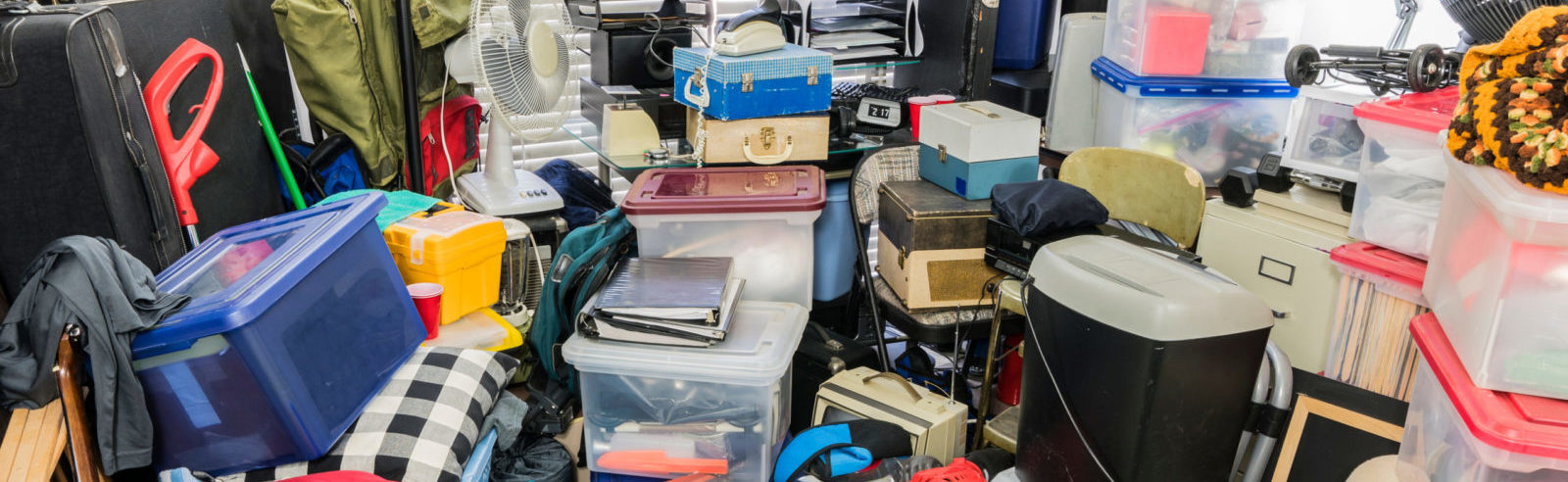 a cluttered space in need of a cleanout service